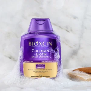 شامپو ضد ریزش و حجم دهنده بیوتین و کلاژن بیوکسین Bioxcin بنفش مدل collagen and biotin اصل